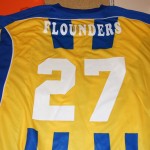 Back screen print of team name and number