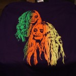 Screen print in green, orange, and yellow