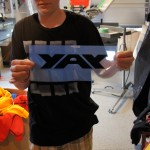 Tucker showcasing his YAY logo film