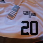A white Adidas sports jersey featuring the number 20, “TYEE TOTEMS,” and a totem graphic on the front—perfect for showing your school team spirit. Tags are attached to the collar. Rain City West