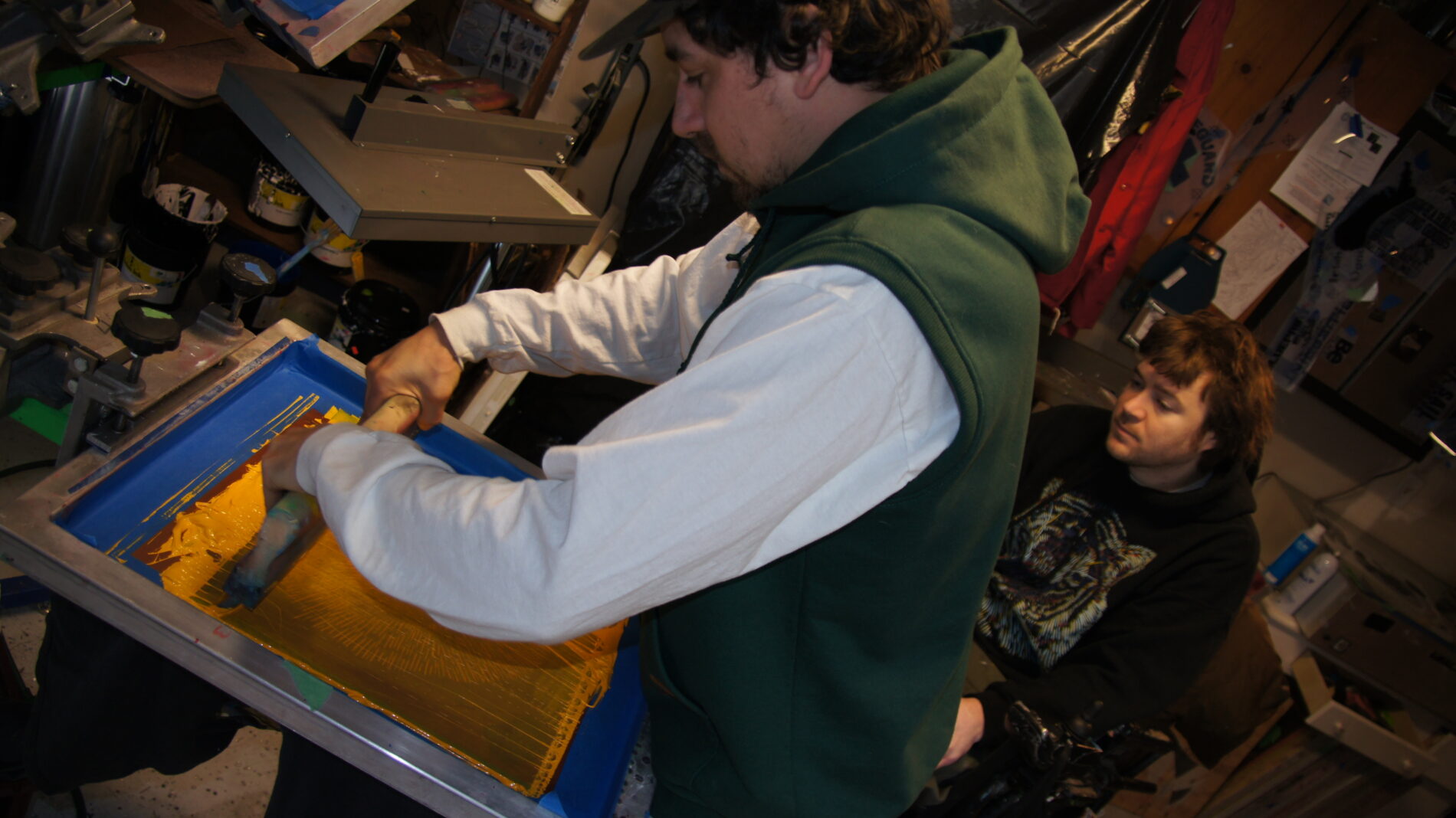 Rick screen printing one of the layers