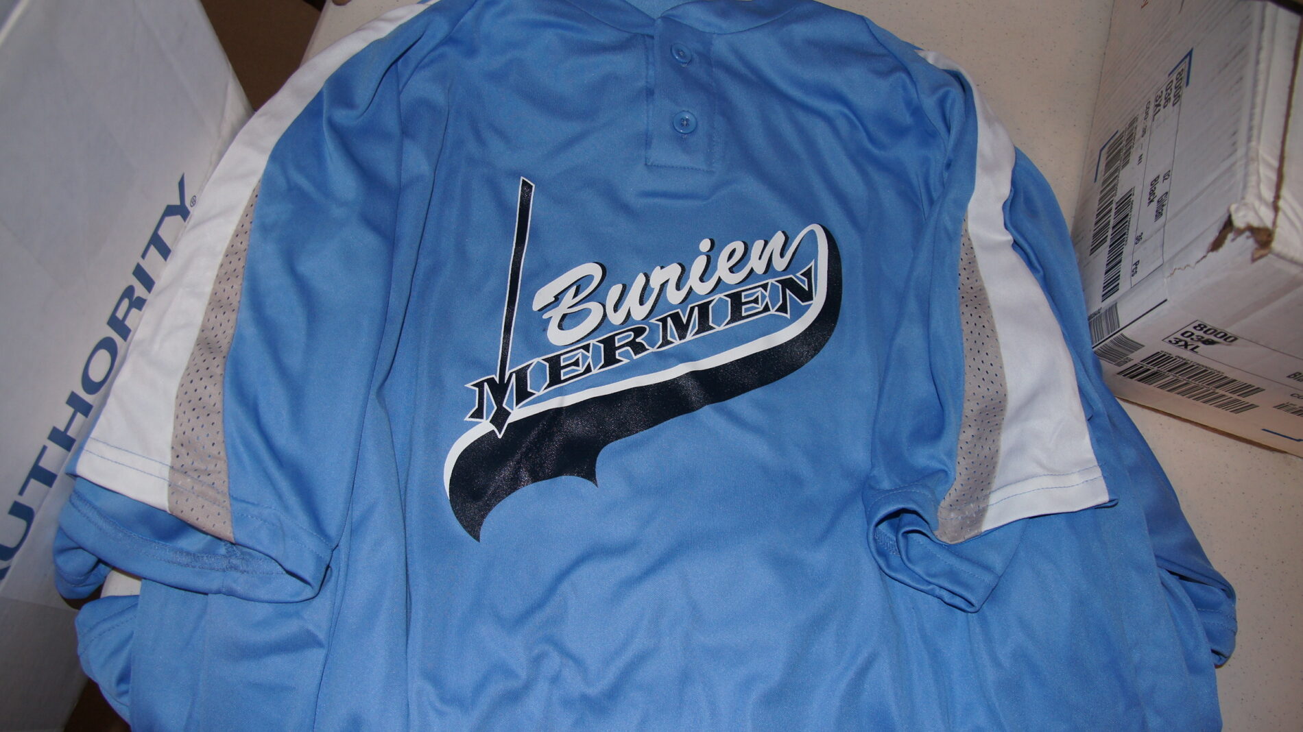 Burien Mermen baseball jerseys.