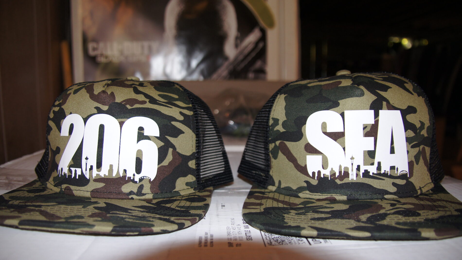 Hats with 206 and SEA on the front.