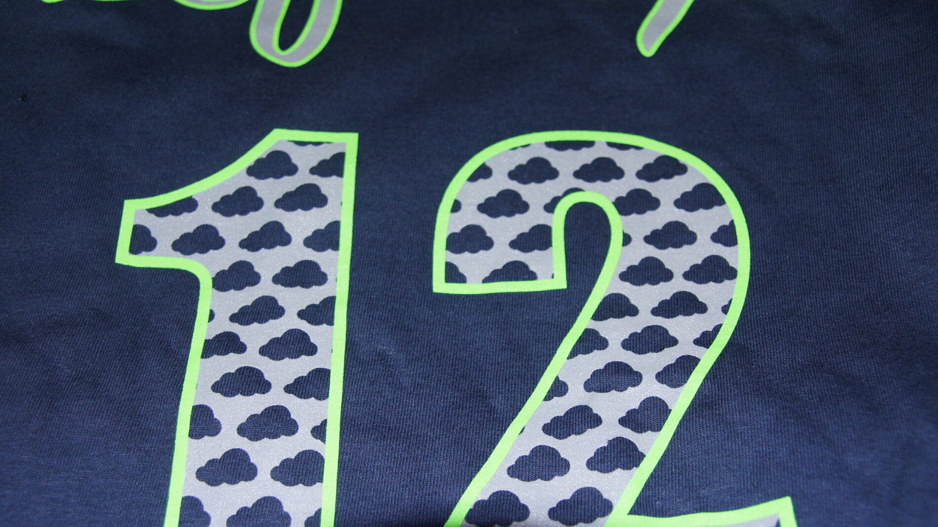 Close up of the 12 with Left Top's signature clouds.
