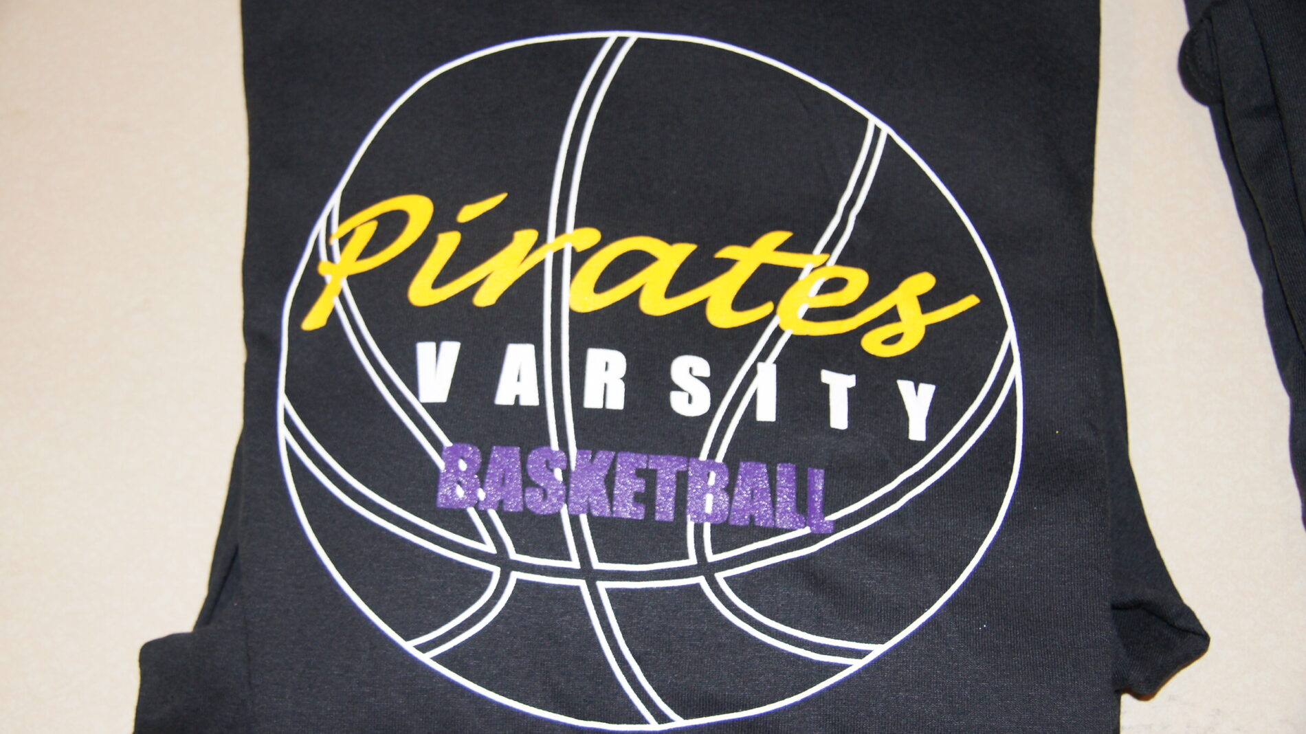 3-color screen print for Pirates Varsity Basketball team.