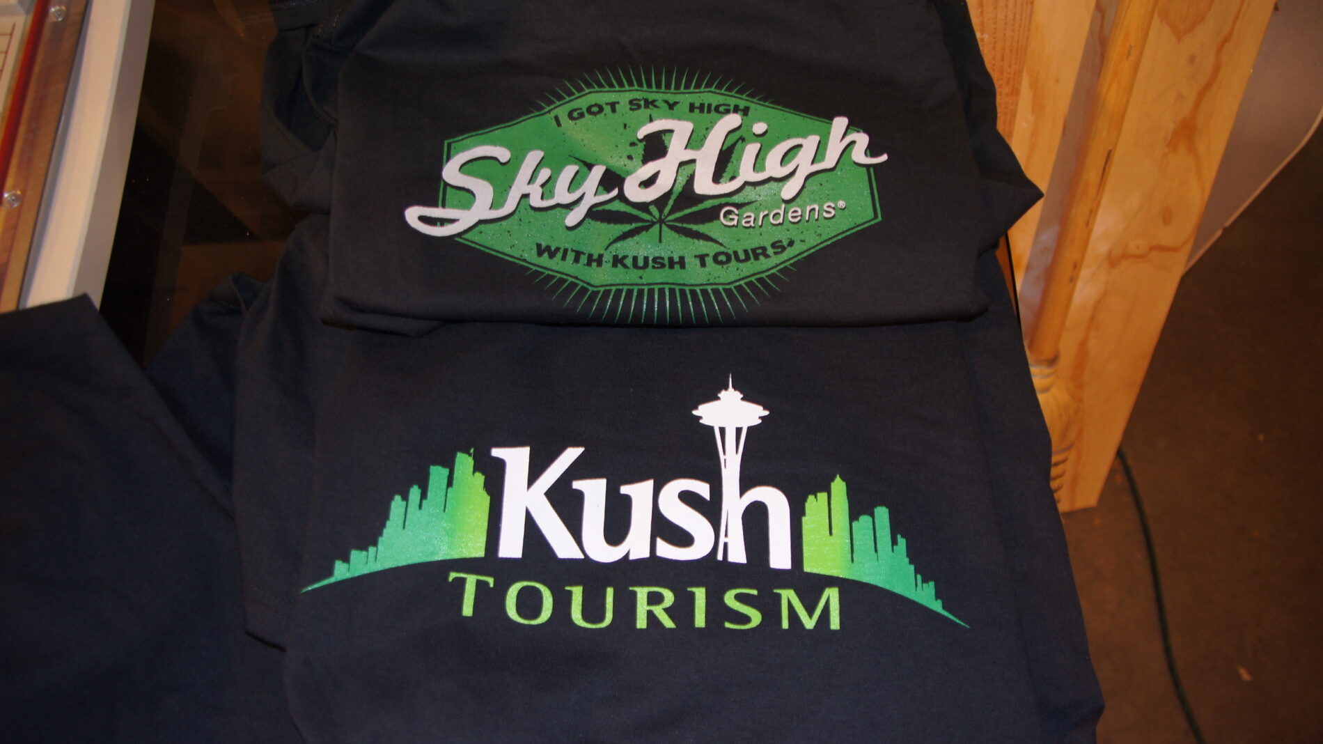 Kush Tourism screen printed t-shirts.