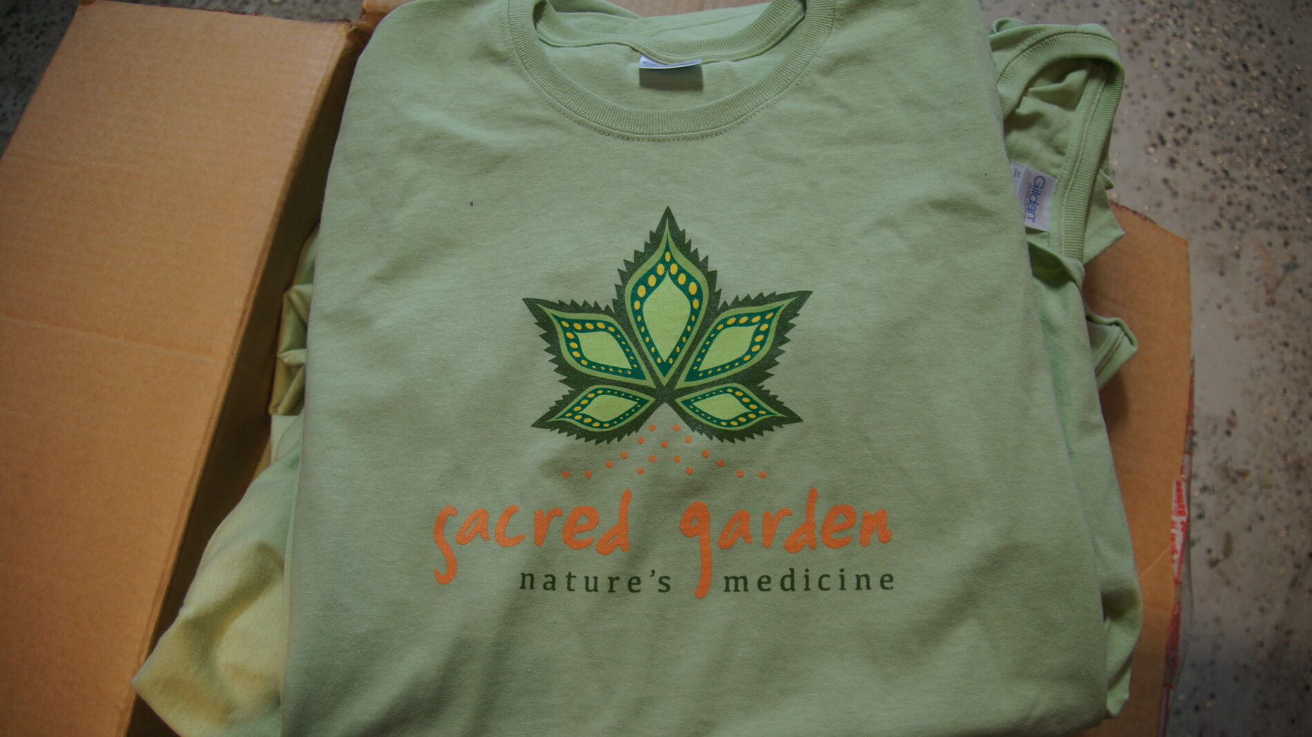 Multi-colored screen printed t-shirt for Sacred Garden