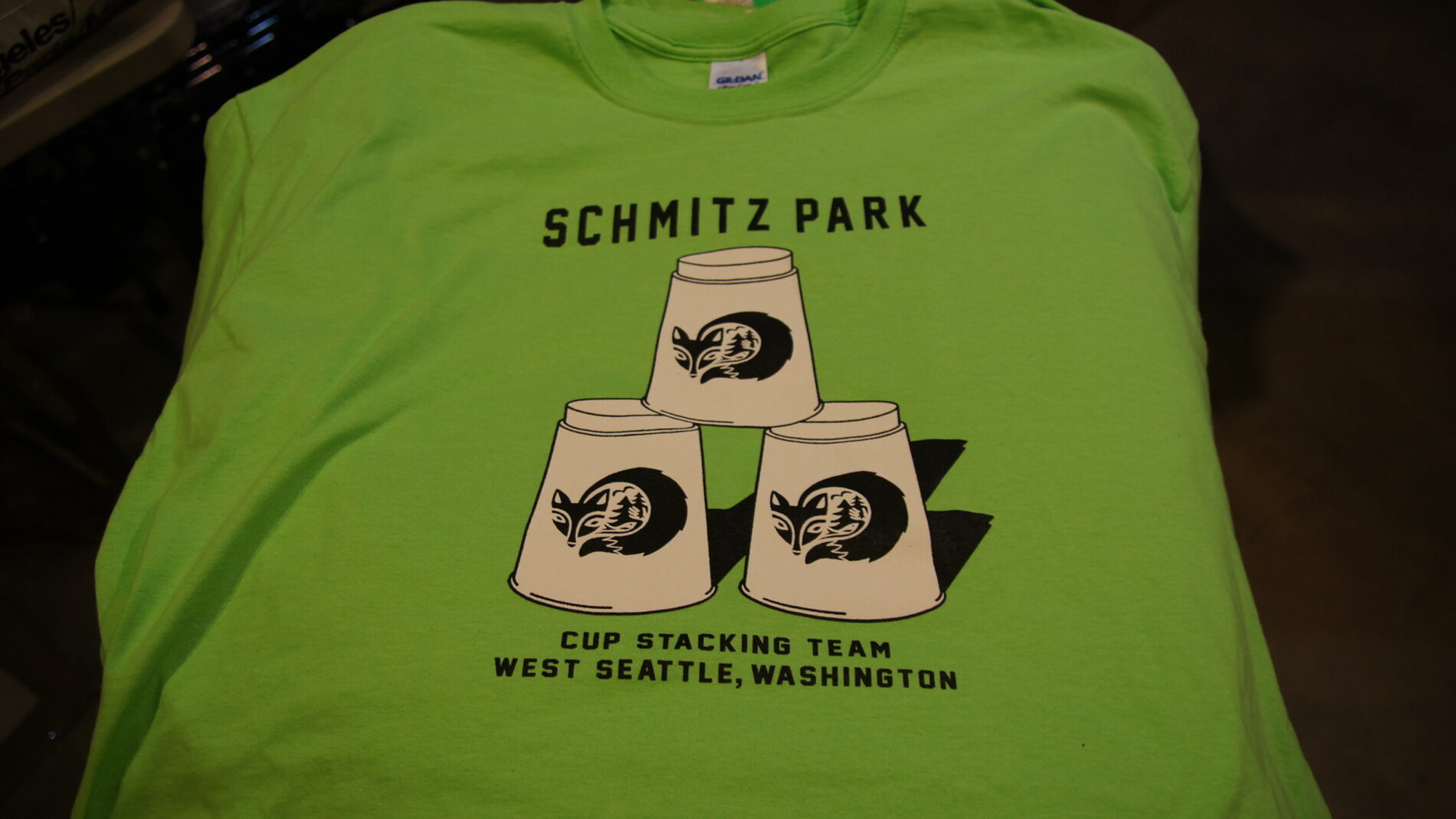 Custom designed 2-color screen print for Schmitz Park cup stacking competition.