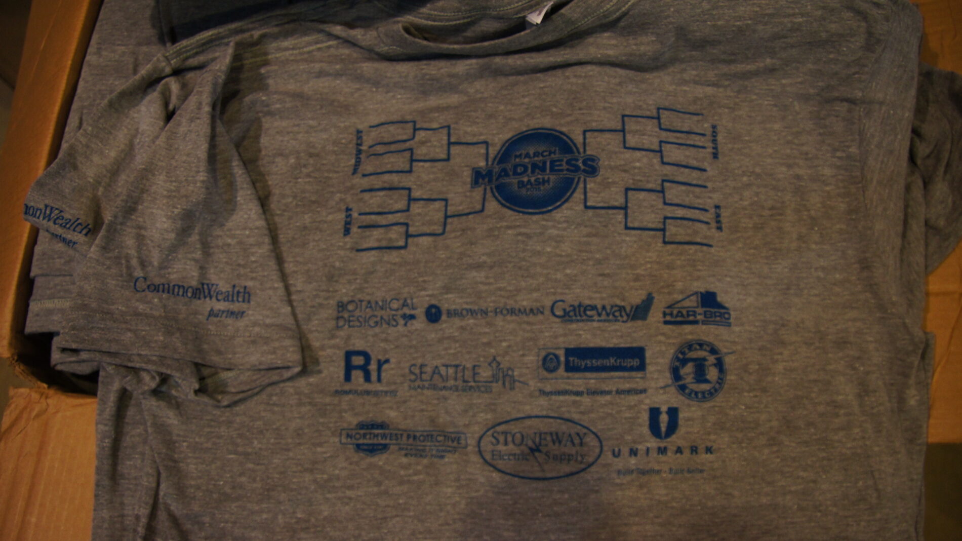 1-color screen print on the back of March Madness t-shirt. 