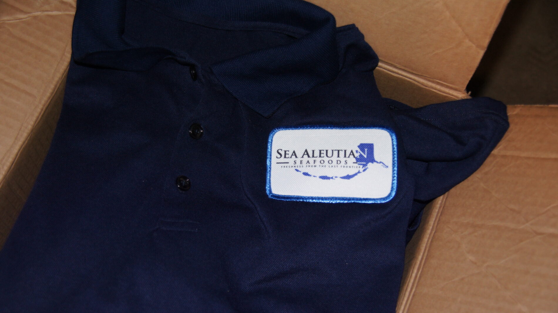 Polo with a patch on it.