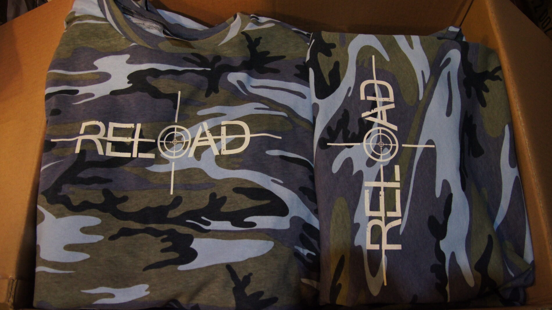 Camo t-shirt screen printed with Reload logo