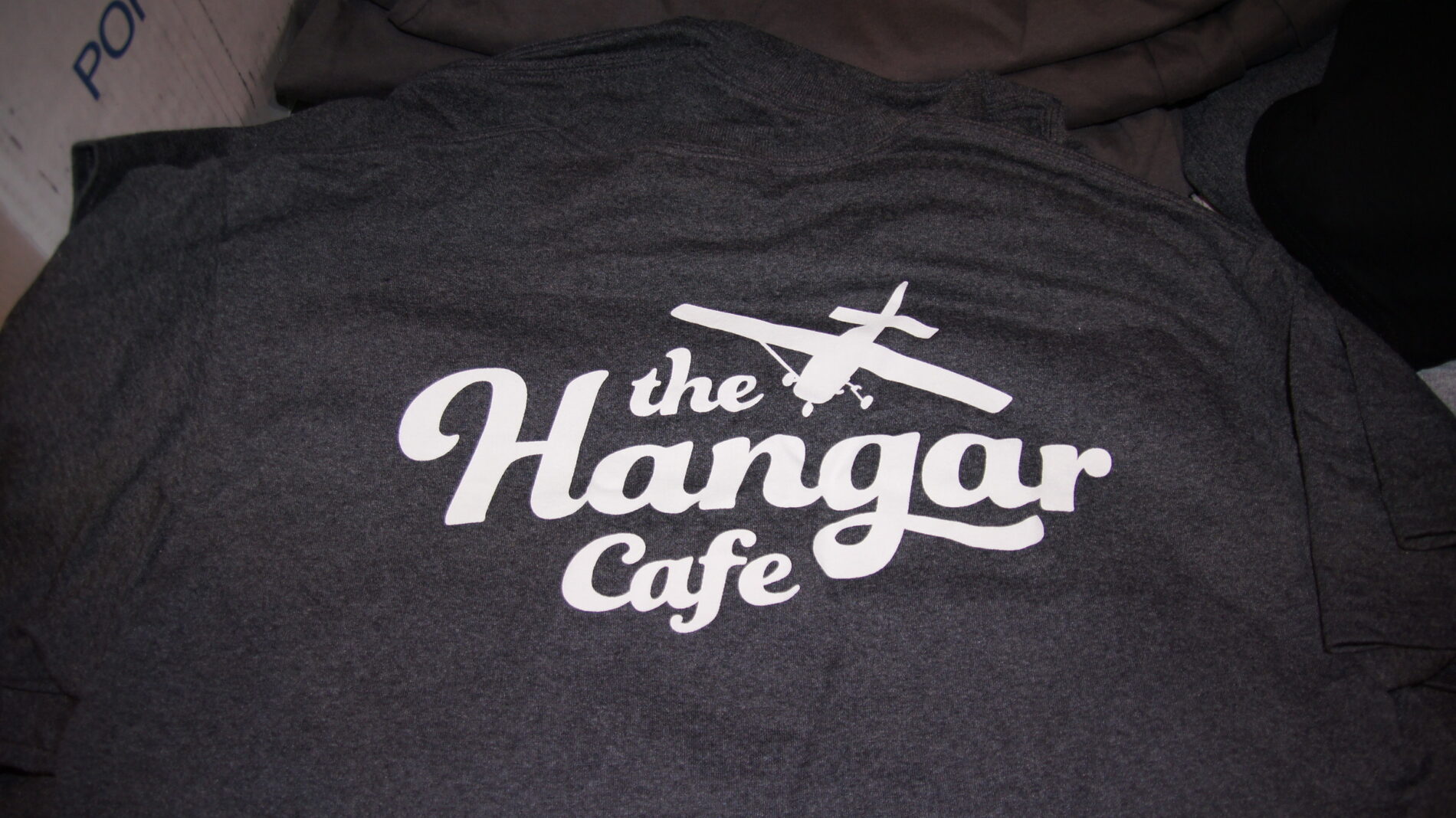 Screen printed t-shirts for the Hanger Café. 