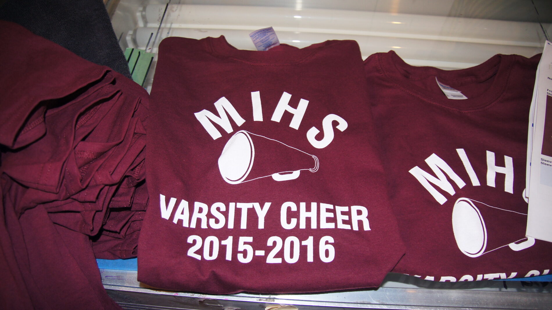 The varsity squad is moving on! To keep the memories alive, MIHS Varsity Cheer made these t-shirts. 1-color print on maroon t-shirts.