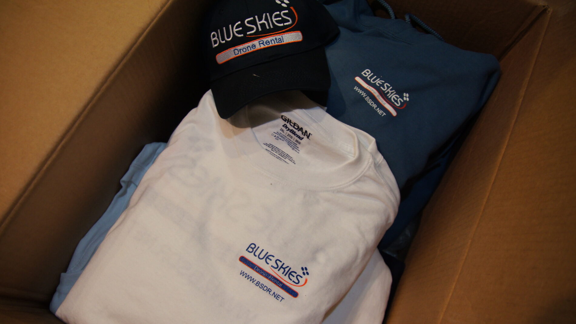 Blue Skies Drone Rental screen printed t-shirts and embroidered cap. 