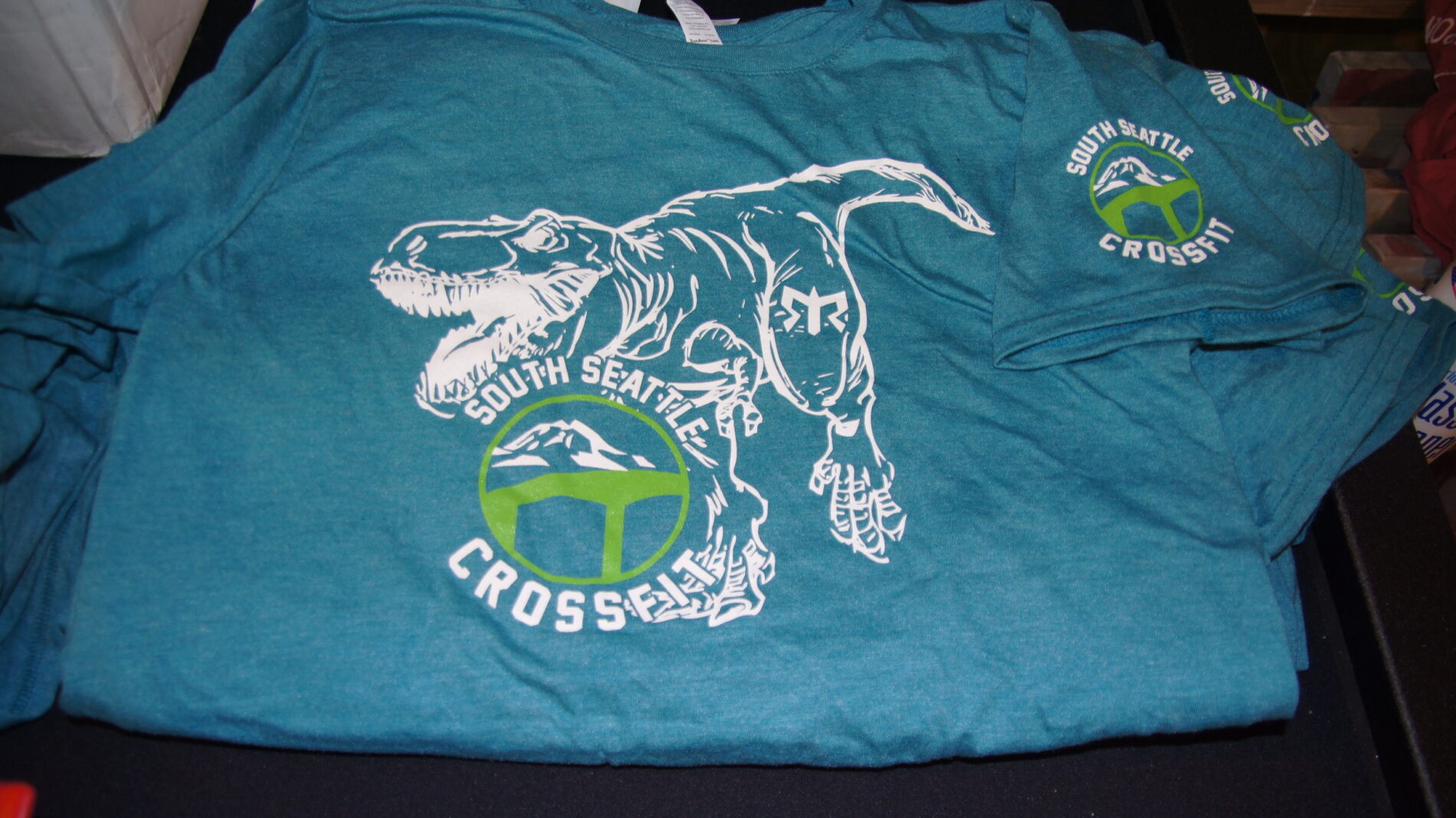 Tournament screen printed t-shirts for South Seattle Crossfit. RAWR!