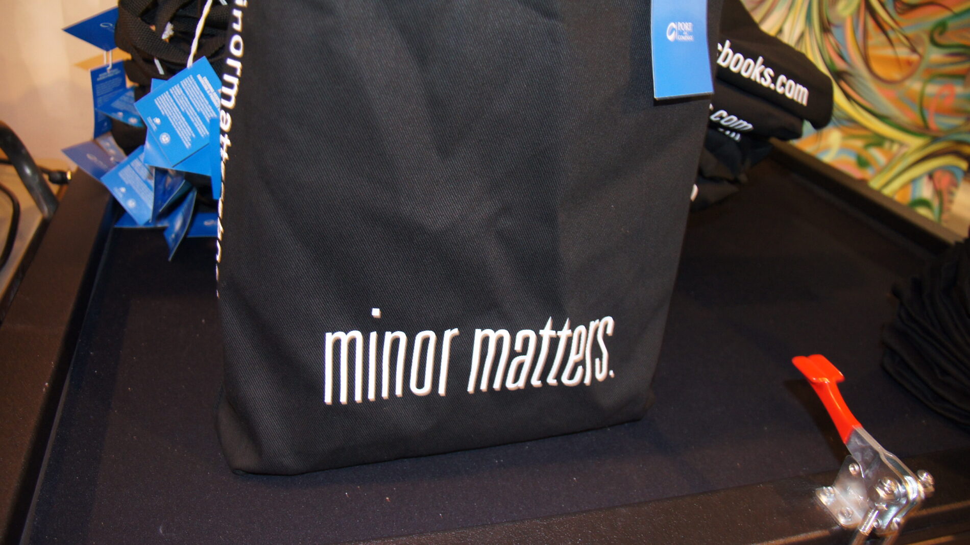 Screen printed book tote bags for local publisher Minor Matter Books.