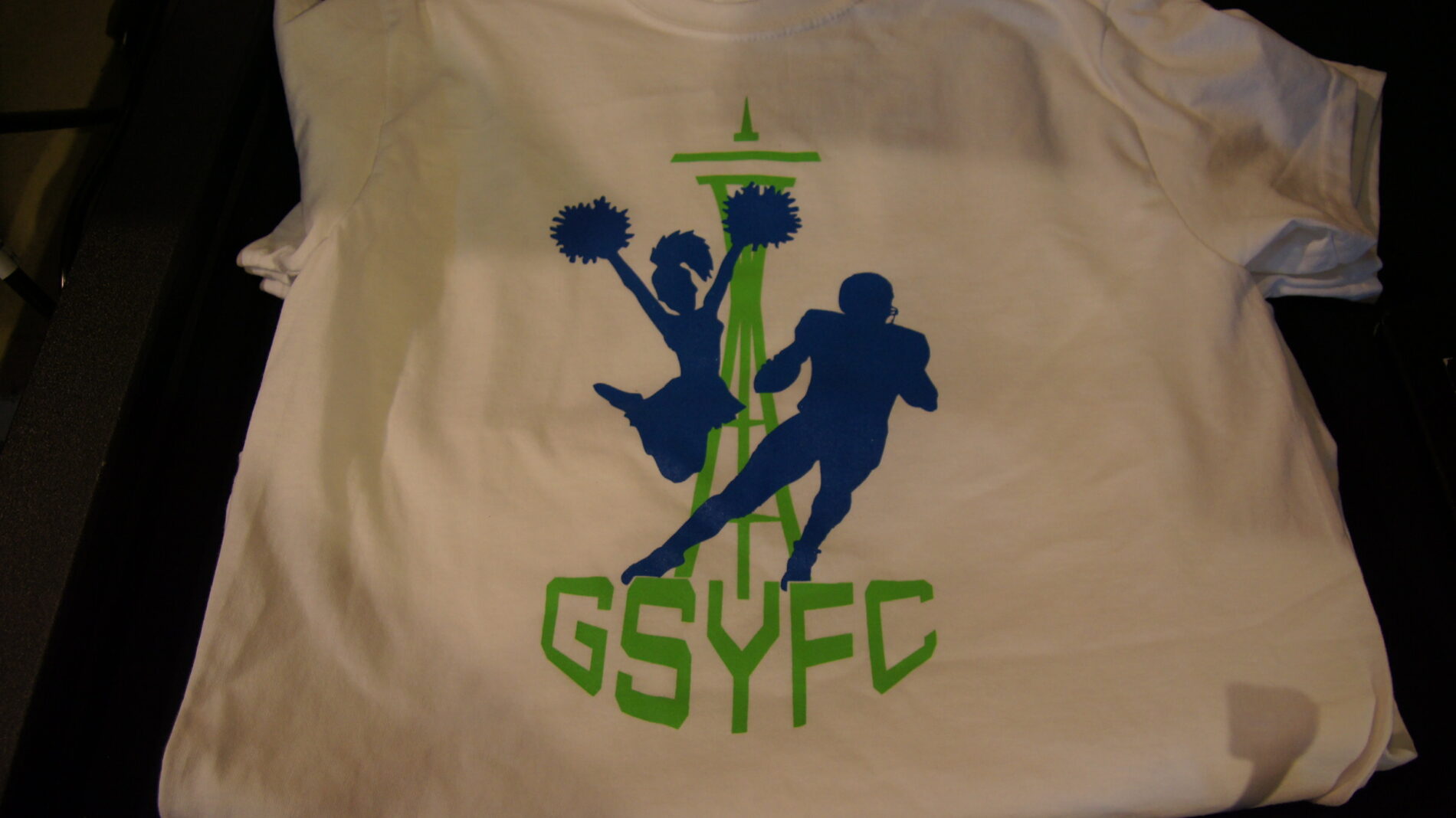 2-color front and 1-color back screen printed t-shirts for Greater Seattle Youth Football and Cheer. 