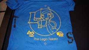 1-color screen printed royal blue t-shirt for team Lego Tekerz.