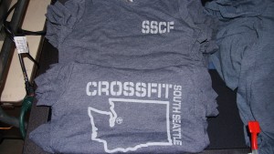 Blue Next Level tees with Washington State design.