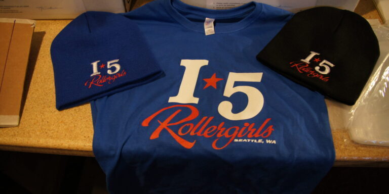 Screen printed and embroidered I5 Rollergirls shirts and hats