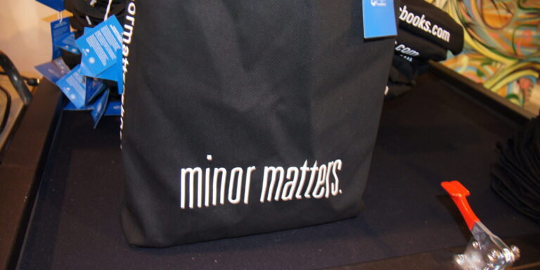 Screen printed book tote bags for local publisher Minor Matter Books.
