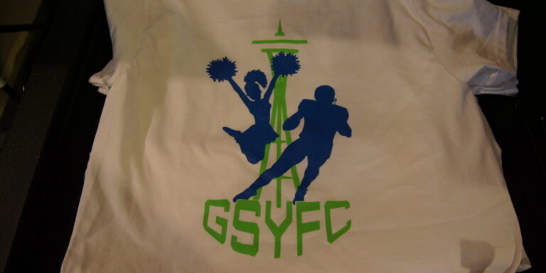 2-color front and 1-color back screen printed t-shirts for Greater Seattle Youth Football and Cheer. 